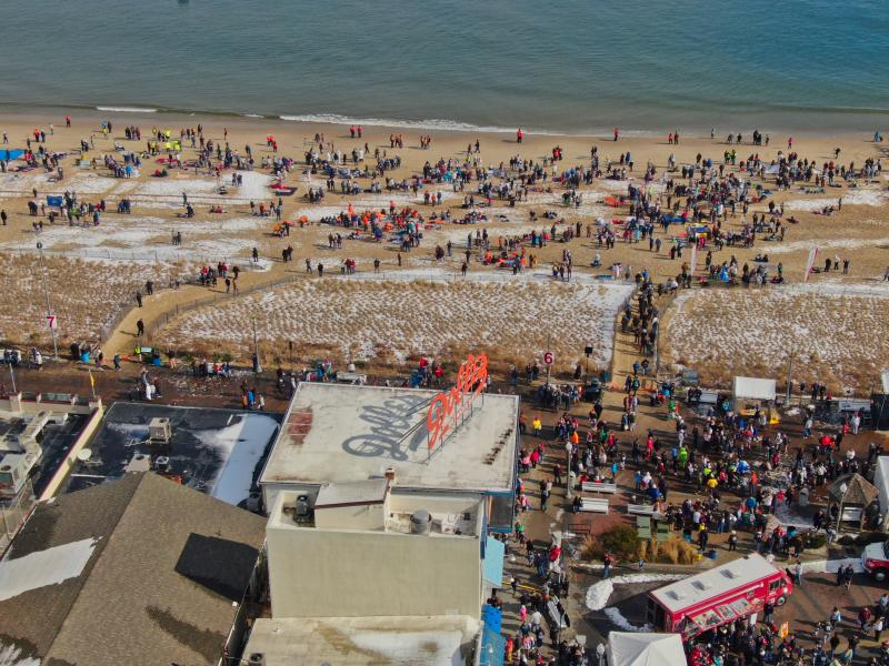Brave souls - 3,544 of them - make the plunge into the chilly water off Rehoboth Avenue. TJ REDEFER PHOTO